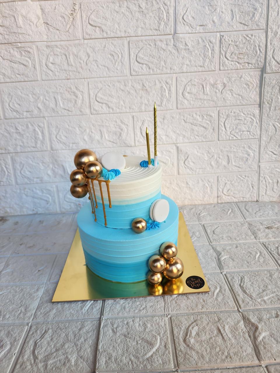 Ocean Blue Gold Celebration Cake