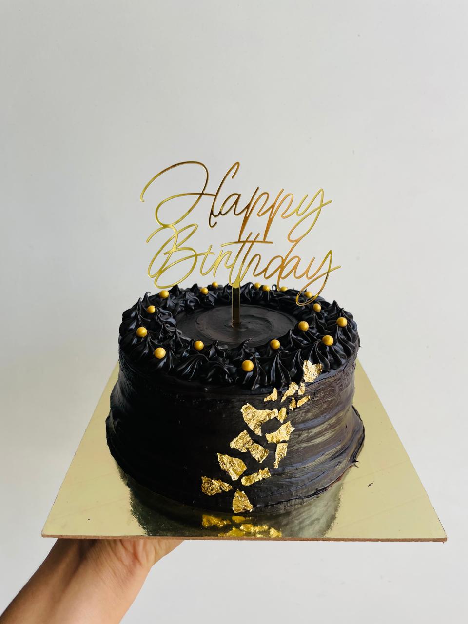 Black Chocolate Cake with Gold Accents